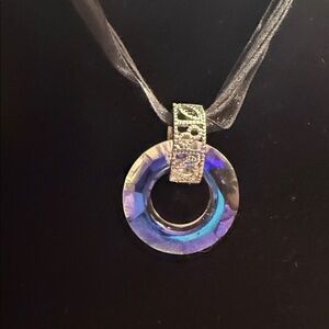 Iridescent Blue Circle Pendant Necklace with Silver Accent